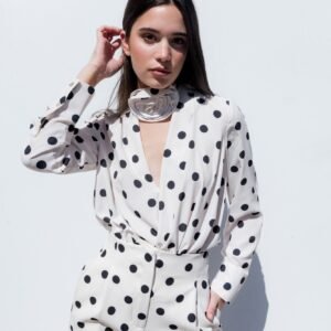 Pantalón crudo estampado con lunares de Emarola