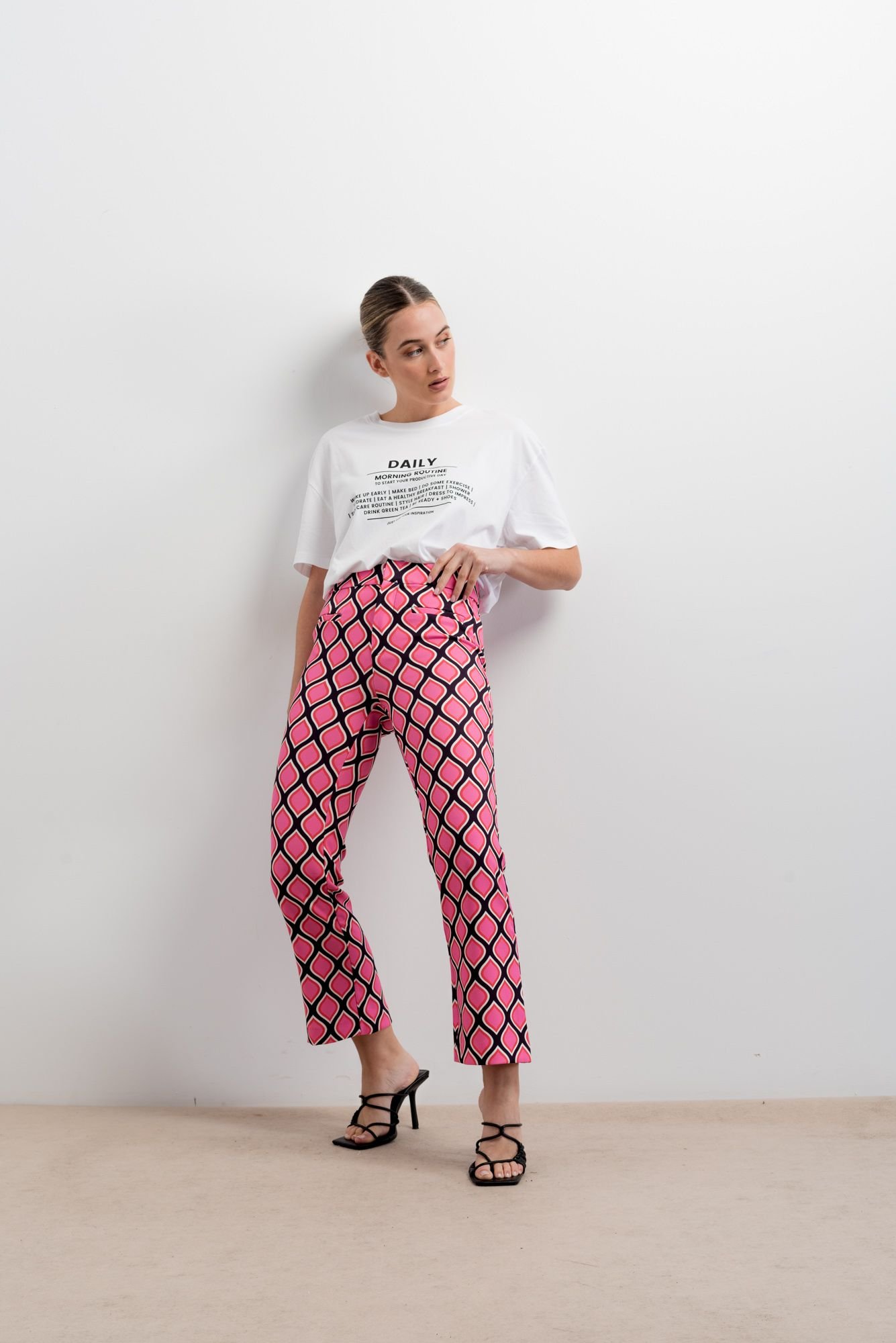 Pantalón rosa mini flare estampado de Emarola